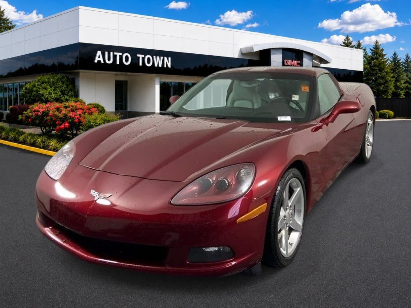 2006 Chevrolet Corvette 2dr Cpe in Monterey Red Met Tintcoat — front three-quarter view