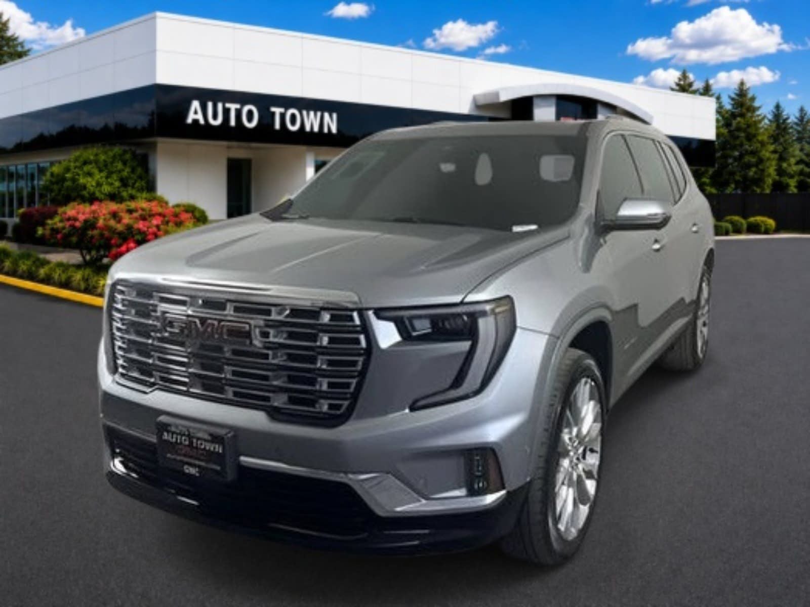 2024 GMC Acadia AWD Denali in Sterling Metallic — front three-quarter view