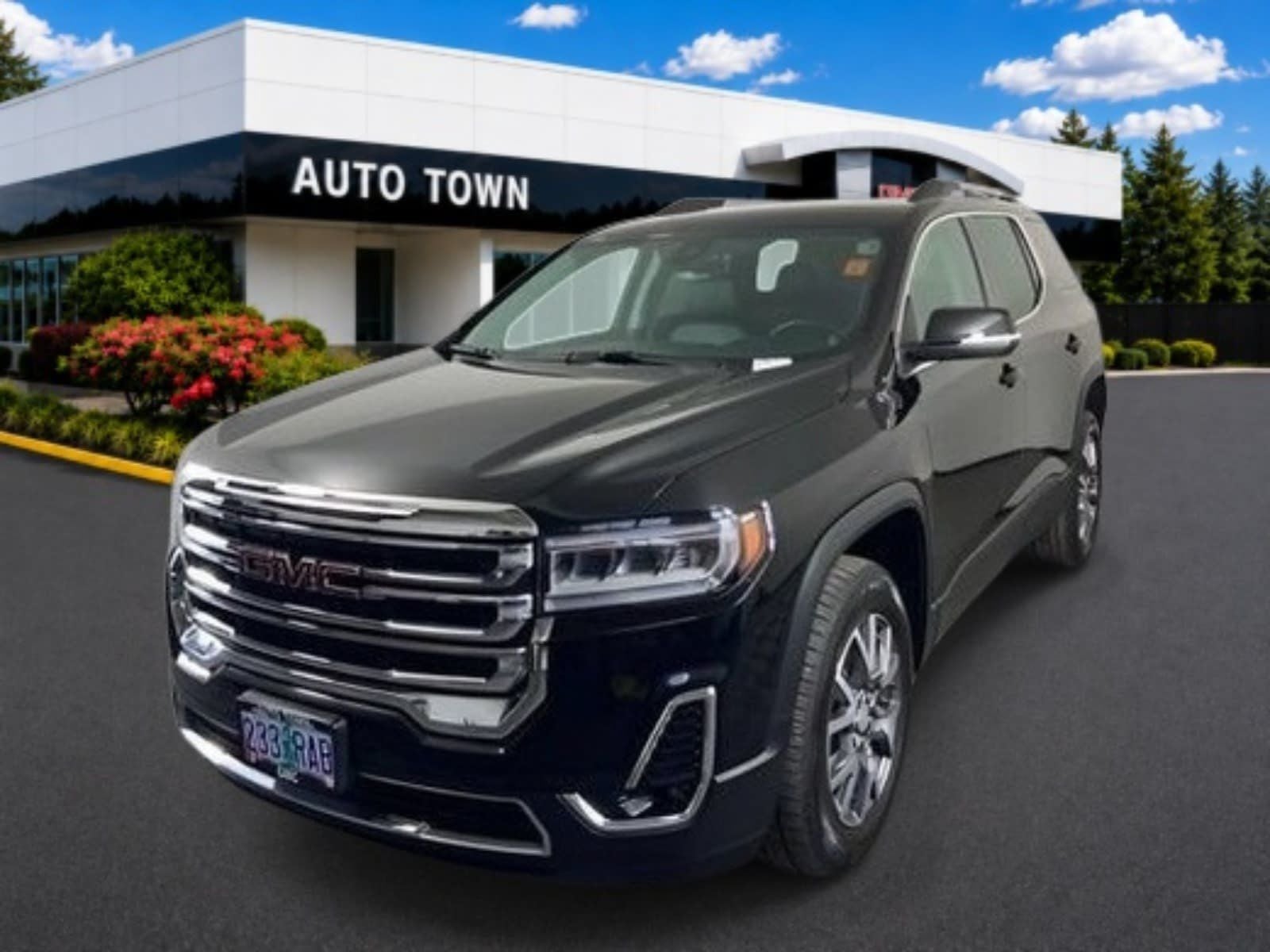 2023 GMC Acadia AWD SLT in Ebony Twilight Metallic — front three-quarter view