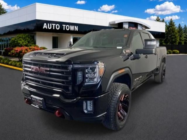 2021 GMC Sierra 2500 HD Crew Cab Standard Box 4-Wheel Drive AT4 in Ebony Twilight Metallic — front three-quarter view