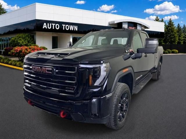 2024 GMC Sierra 3500 HD Crew Cab Long Box 4-Wheel Drive AT4 in Onyx Black — front three-quarter view