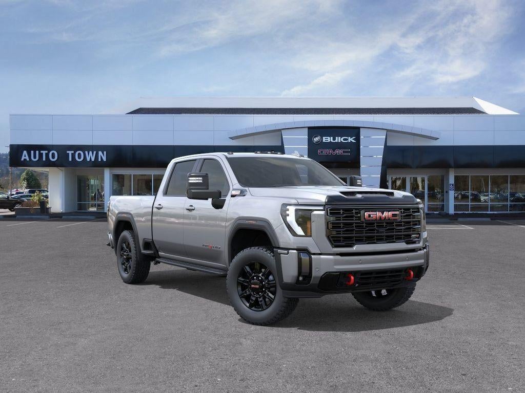 2026 GMC Sierra 3500 HD Crew Cab Standard Box 4-Wheel Drive AT4 in Sterling Metallic — front three-quarter view