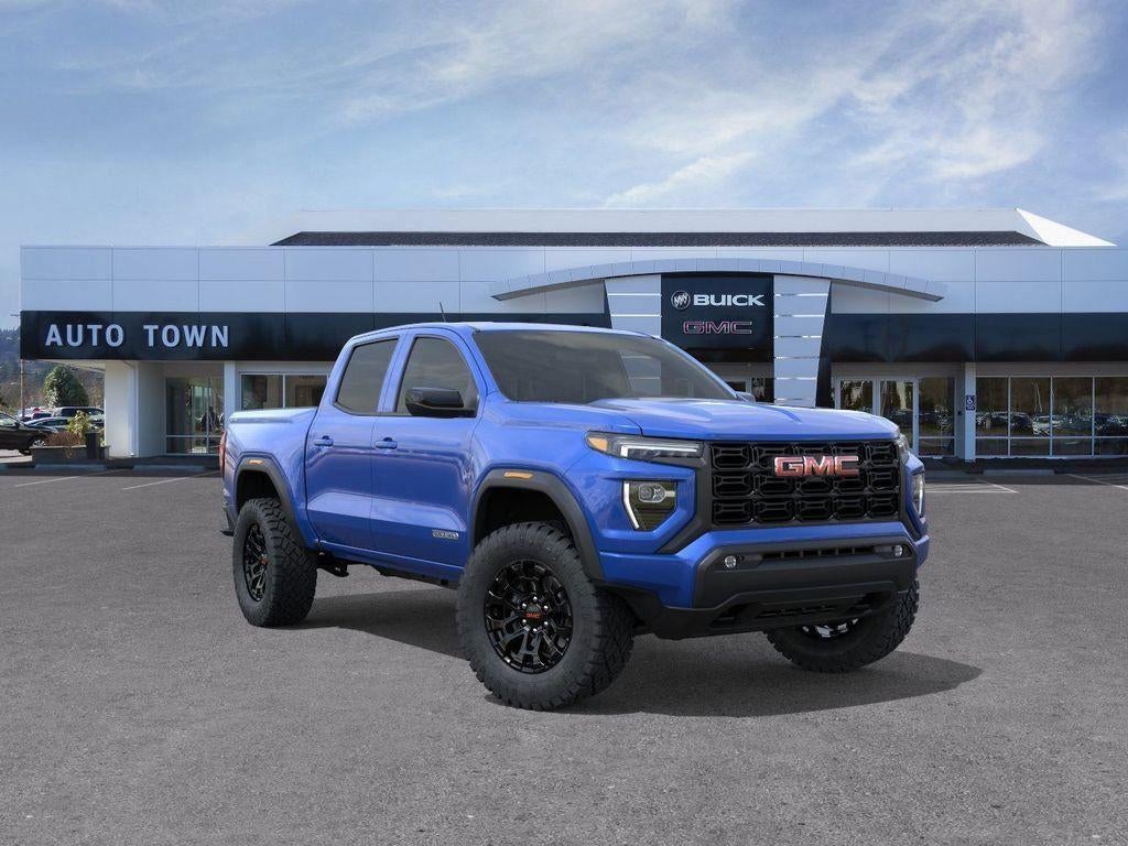 2026 GMC Canyon Crew Cab Short Box 4-Wheel Drive Elevation in Rapids Metallic — front three-quarter view