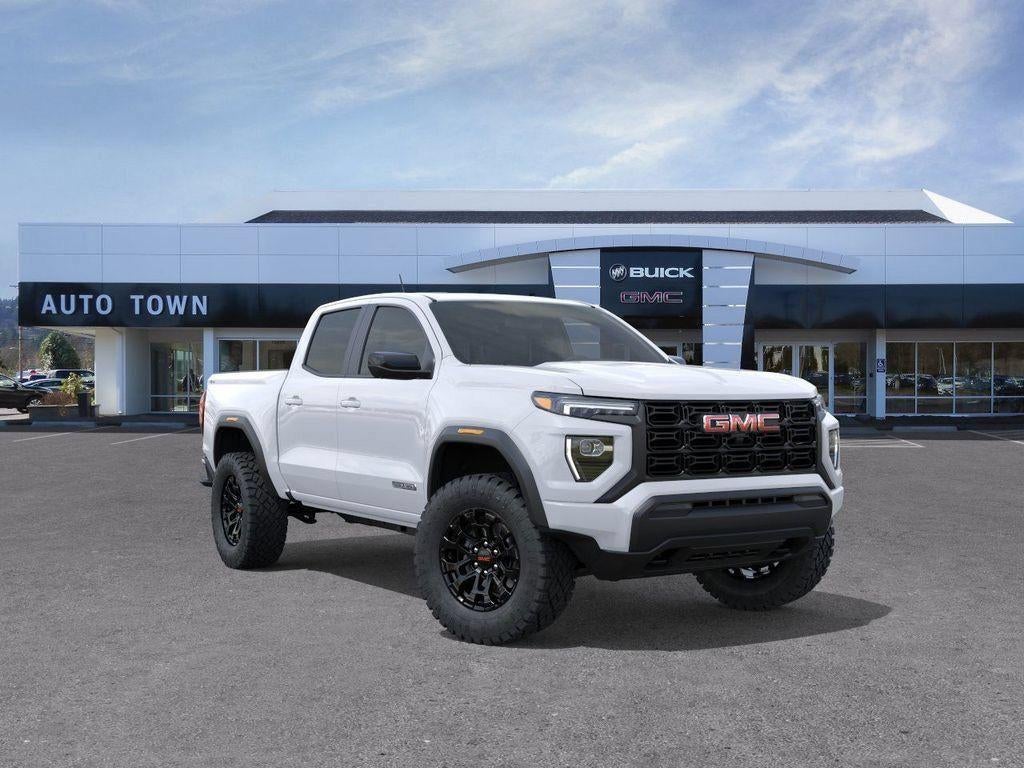 2026 GMC Canyon Crew Cab Short Box 4-Wheel Drive Elevation in Summit White — front three-quarter view