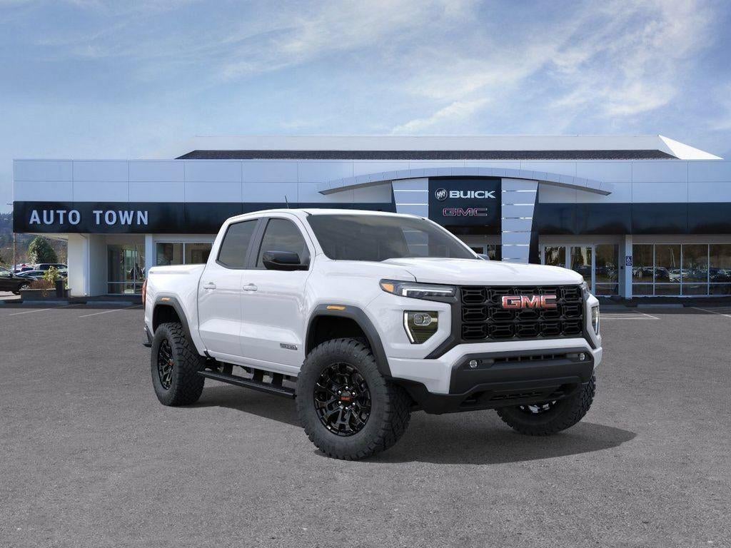 2026 GMC Canyon Crew Cab Short Box 4-Wheel Drive Elevation in Summit White — front three-quarter view