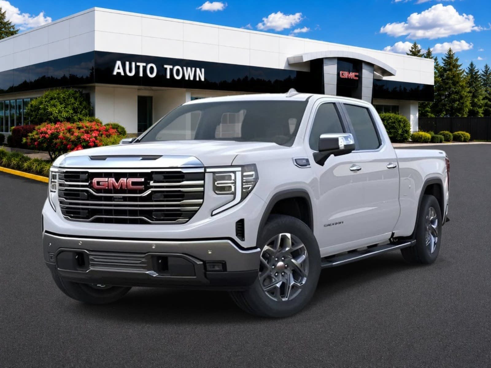 2026 GMC Sierra 1500 Crew Cab Standard Box 4-Wheel Drive SLT in Summit White — front three-quarter view