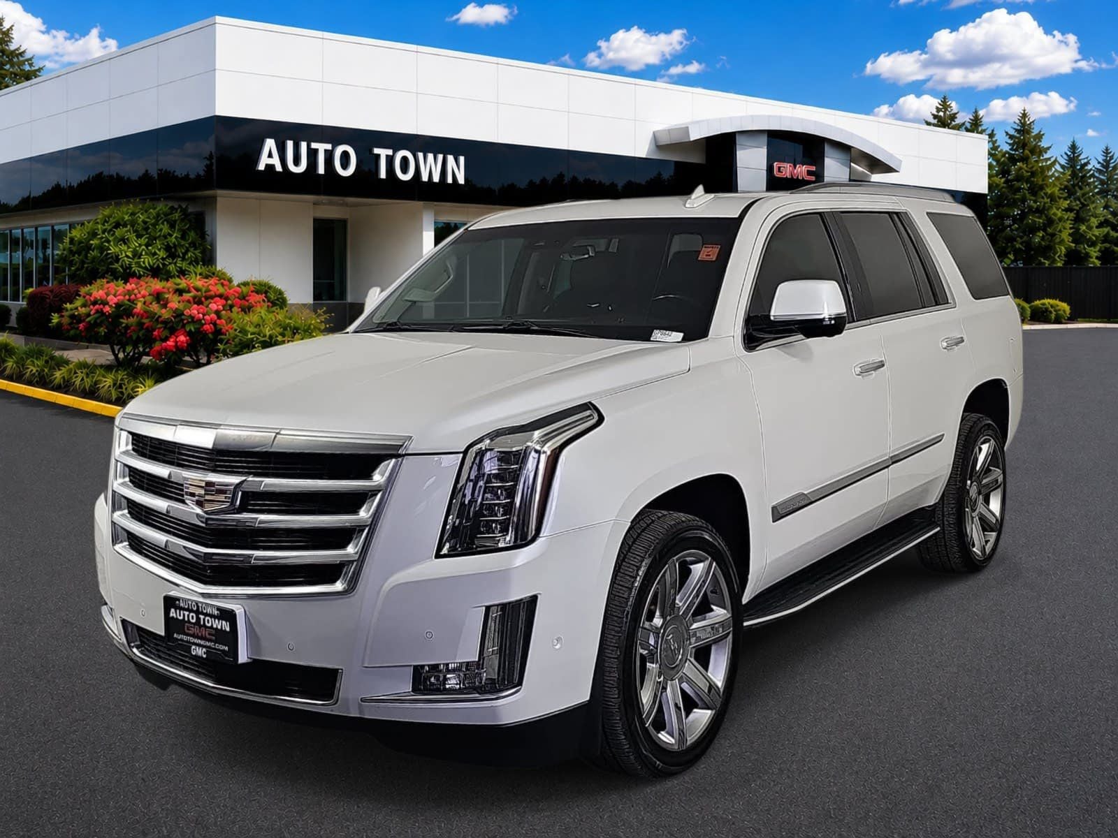 2020 Cadillac Escalade 4WD Luxury in Crystal White Tricoat — front three-quarter view