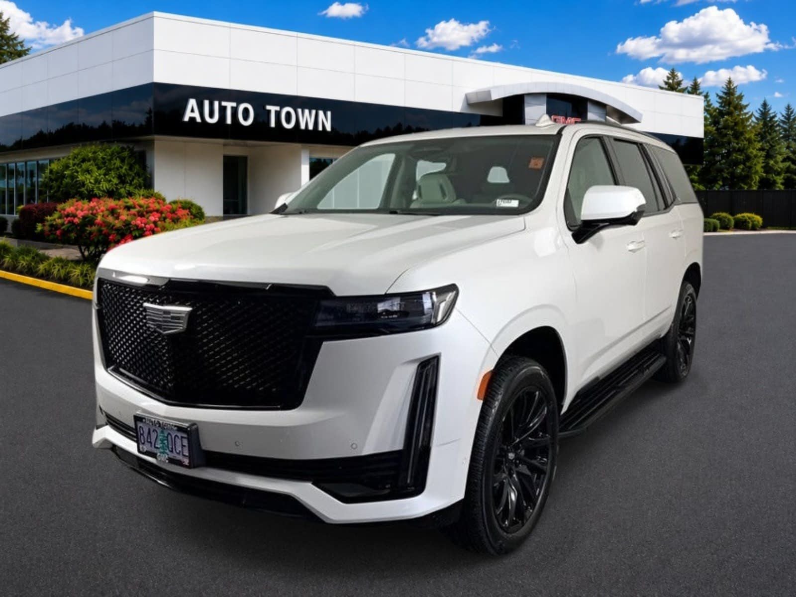 2024 Cadillac Escalade 4WD Sport Platinum in Crystal White Tricoat — front three-quarter view