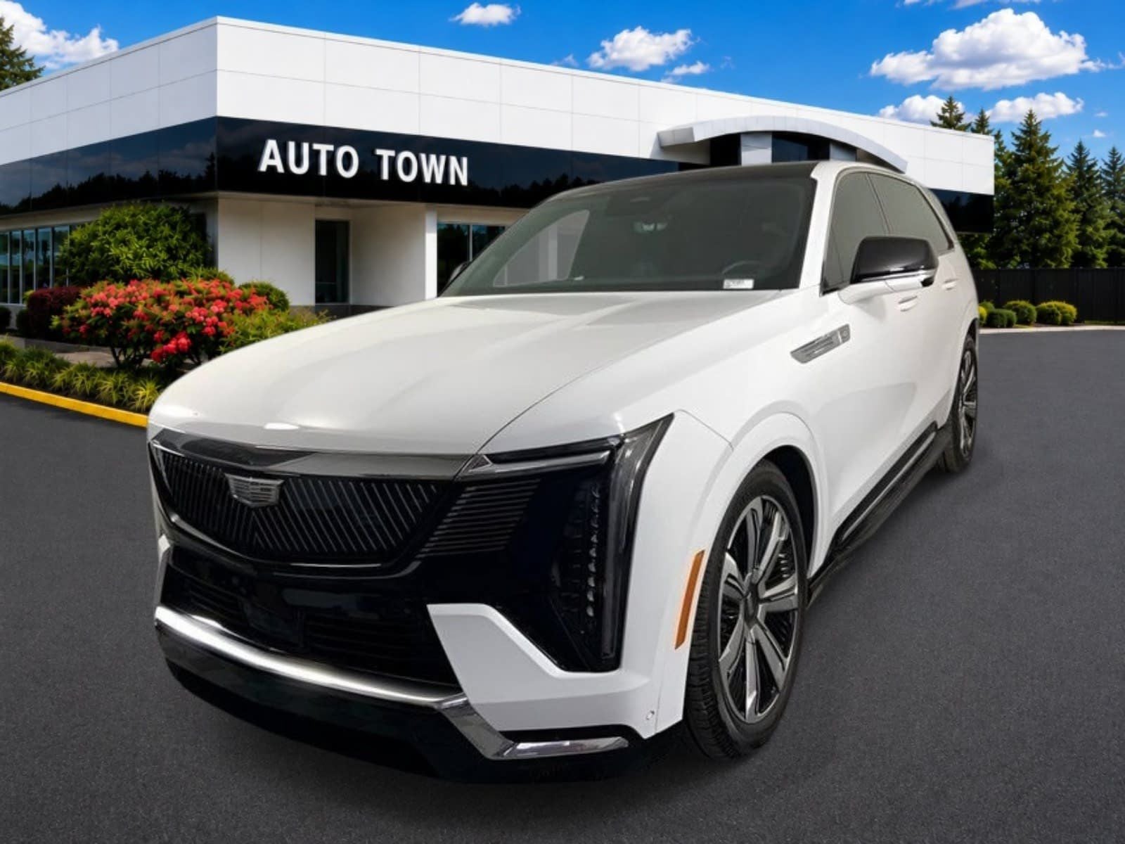 2025 Cadillac ESCALADE IQ AWD Luxury 2 in Summit White — front three-quarter view
