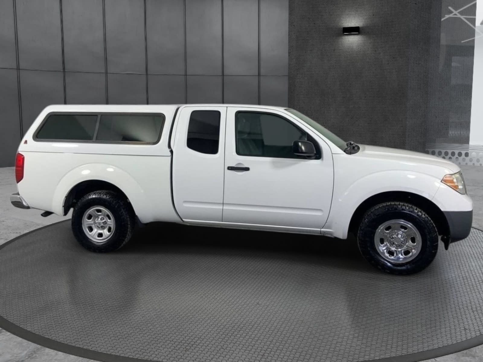 2012 Nissan Frontier — side profile view