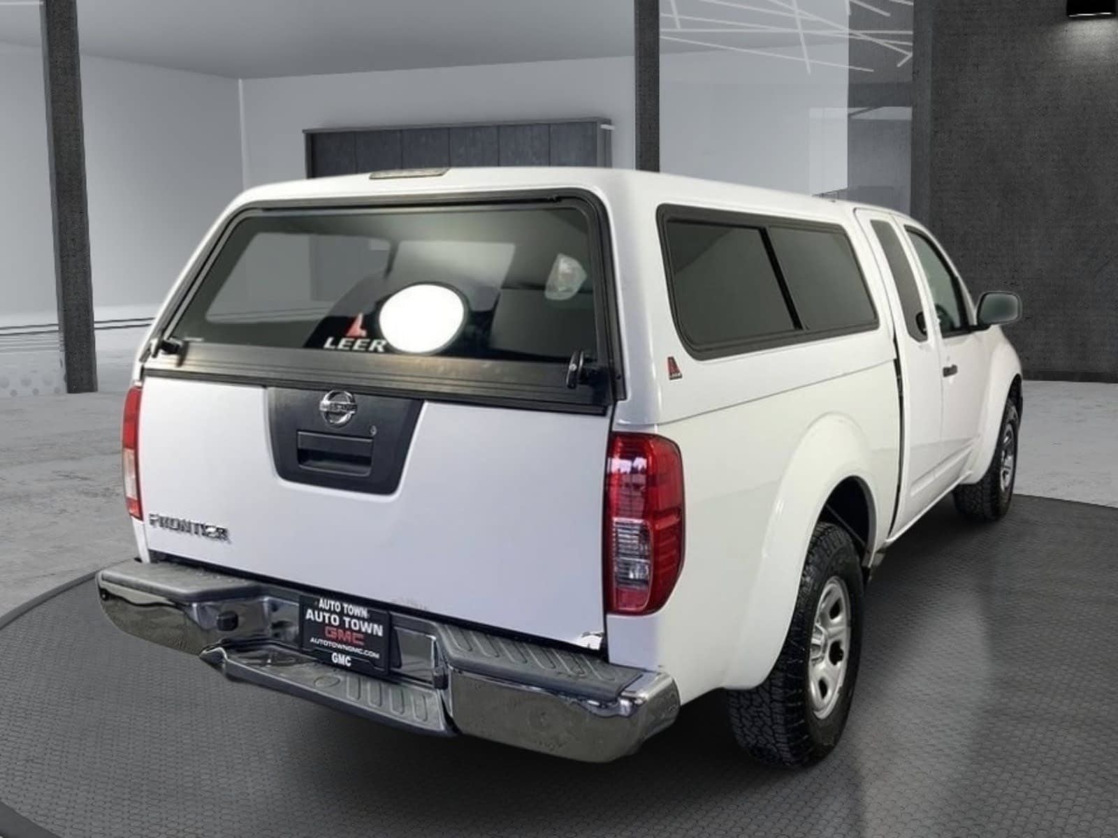 2012 Nissan Frontier — rear three-quarter view