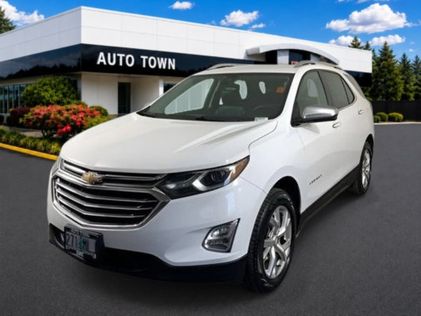 2020 Chevrolet Equinox AWD Premier in White — front three-quarter view