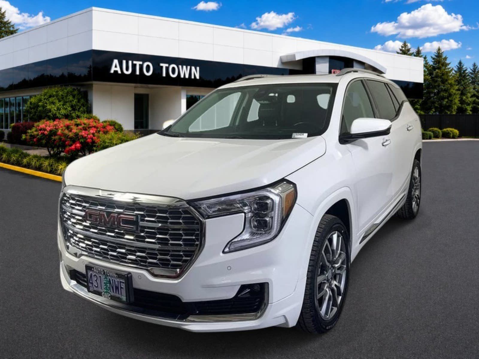 2022 GMC Terrain AWD Denali in Summit White — front three-quarter view