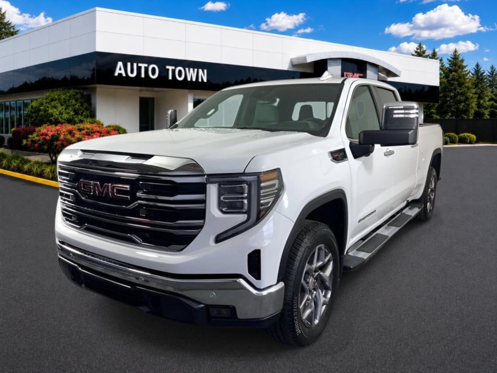 2026 GMC Sierra 1500 Crew Cab Standard Box 4-Wheel Drive SLT in Summit White — front three-quarter view