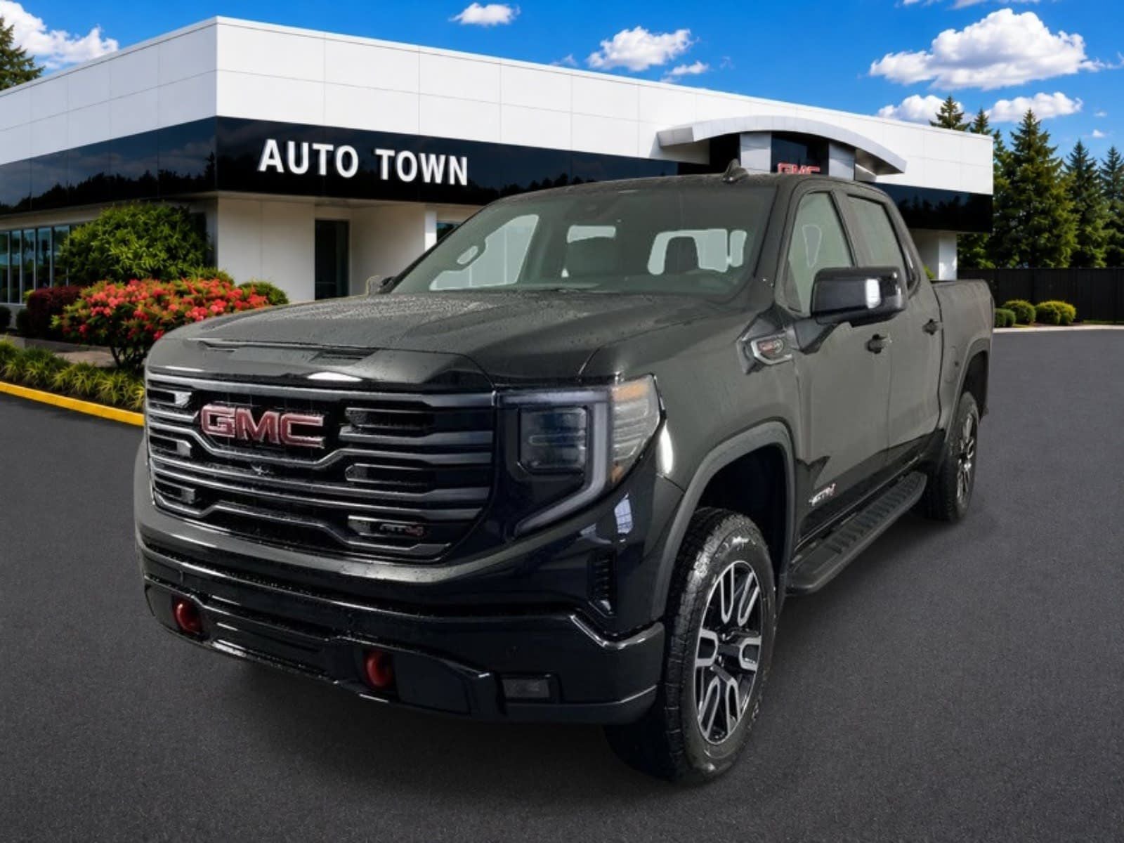 2026 GMC Sierra 1500 Crew Cab Short Box 4-Wheel Drive AT4 in Onyx Black — front three-quarter view